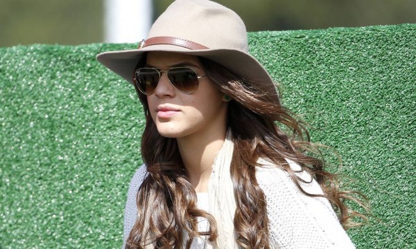 Bruna Marquezine watching the Brazilian National Team training session wearing a cowboy hat