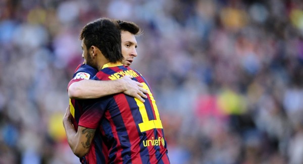Messi and Neymar hugging each other in Barcelona