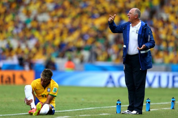 Neymar changing boots in Brazil vs Mexico, at the 2014 FIFA World Cup