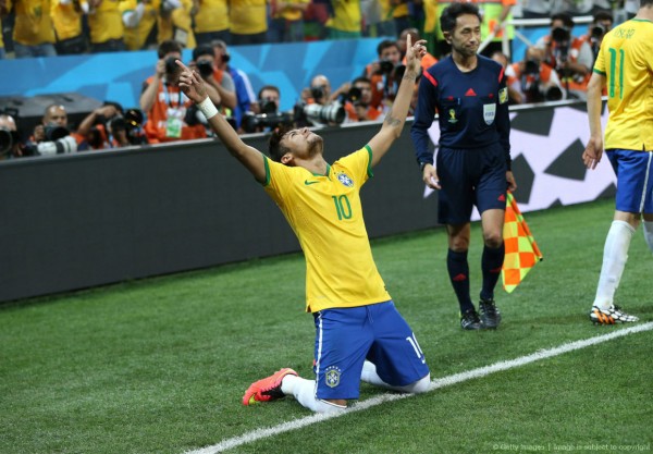 Neymar gets down on his knees to celebrate a goal in Brazil vs Croatia