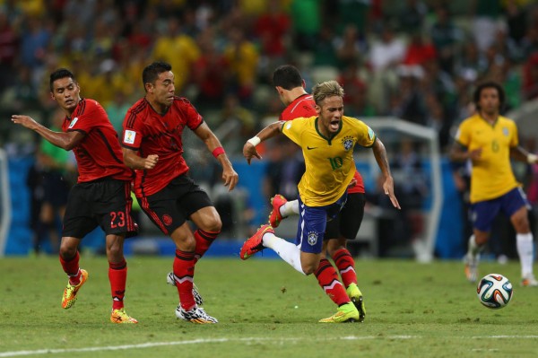 Neymar getting fouled in Brazil vs Mexico in the FIFA World Cup 2014