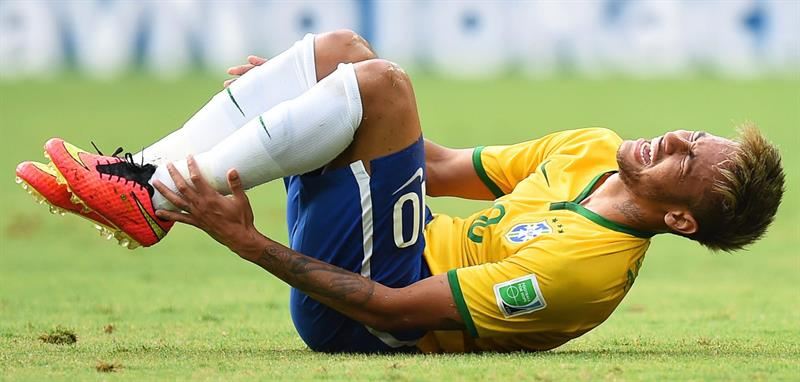 Neymar injured during a game at the FIFA World Cup 2014