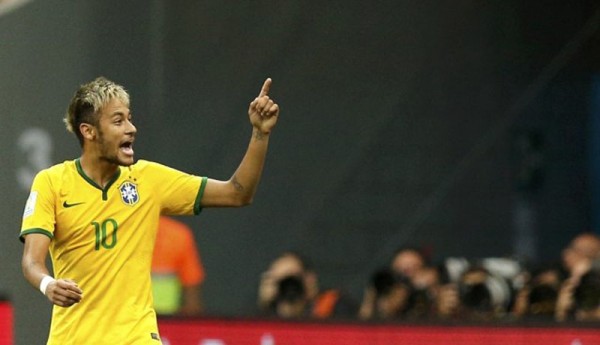 Neymar raising his finger to the air, in a Brazil match