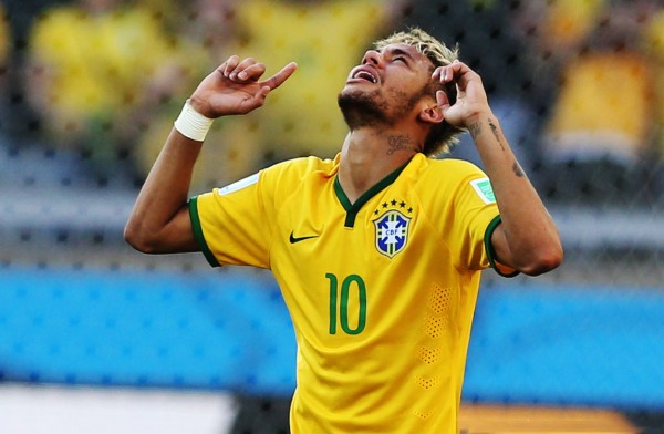 Neymar raising his two fingers to the sky