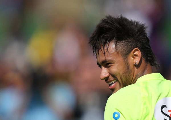Neymar smiling during a training session in Brazil