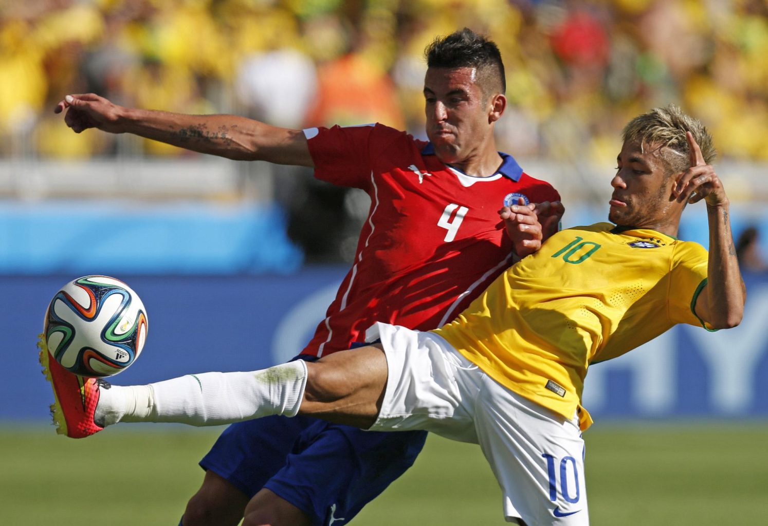 Neymar stretching his leg in Brazil vs Chile