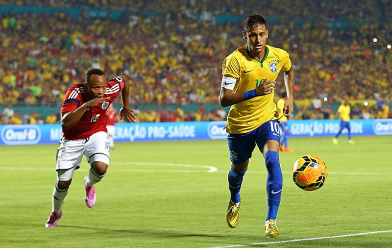Neymar being chased by Zuniga in a friendly between Brazil and Colombia, after the World Cup incident