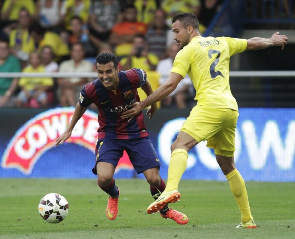 Pedro in action for Barcelona, against Villarreal