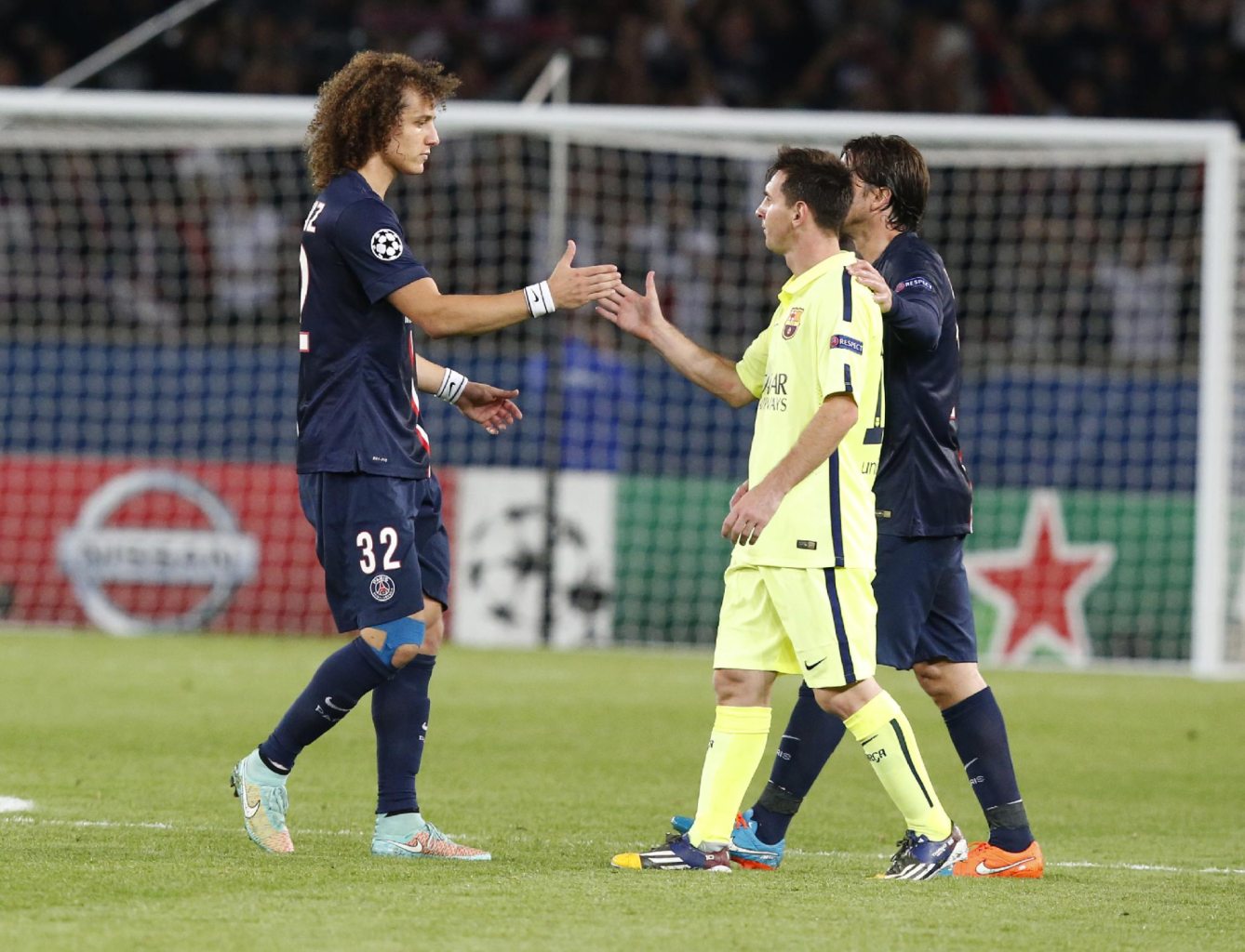 Lionel Messi and David Luiz, after PSG 3-2 Barcelona