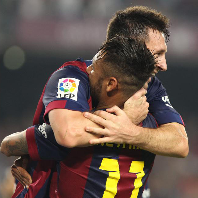 Lionel Messi hugging Neymar