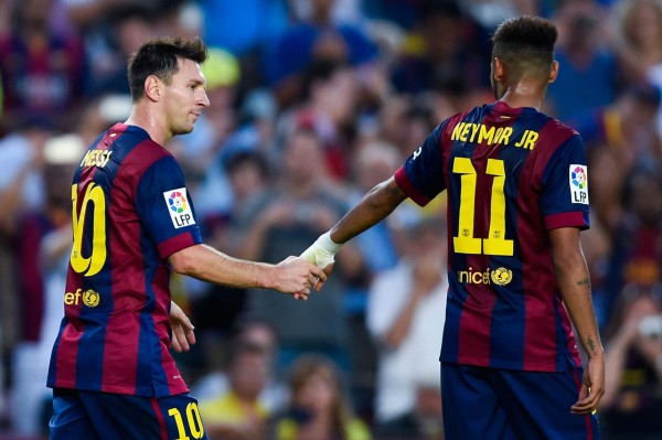 Messi giving his hand to Neymar