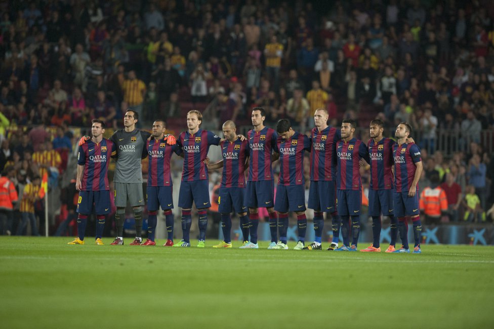 Barcelona players lining up for a minute of silence at the Camp Nou