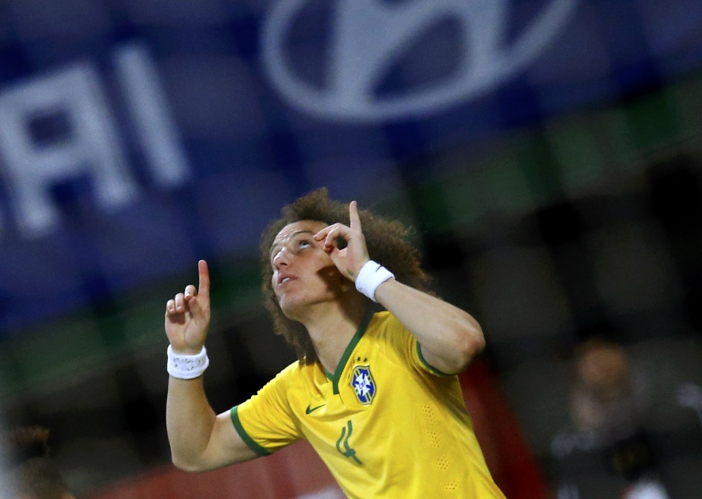 David Luiz celebrating Brazil's first goal against Austria