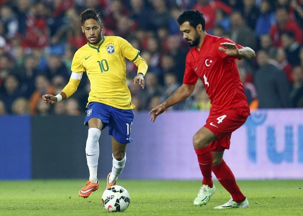 Neymar dribbling a defender in Brazil vs Turkey