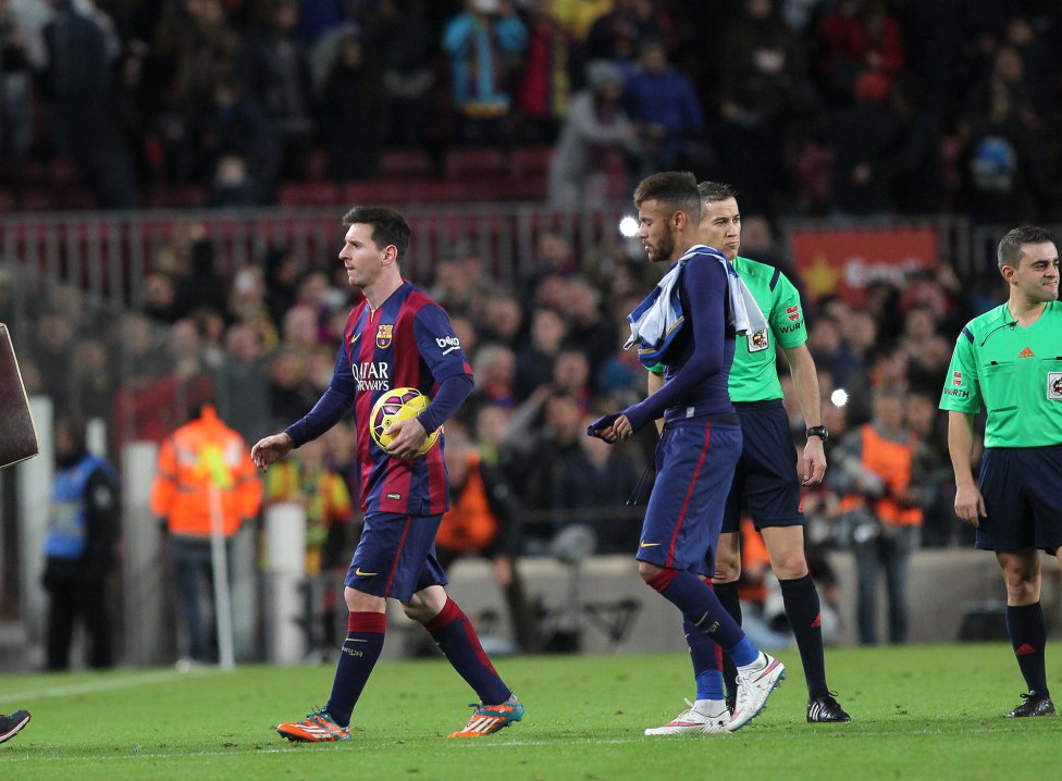 Lionel Messi and Neymar leaving the pitch at the Camp Nou