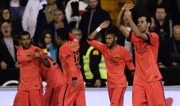 Sergio Busquets celebrating Barcelona goal with his teammates