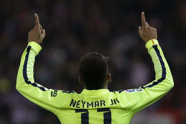 Neymar Jr sticking his two fingers in the air