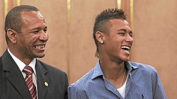 Neymar next to his father