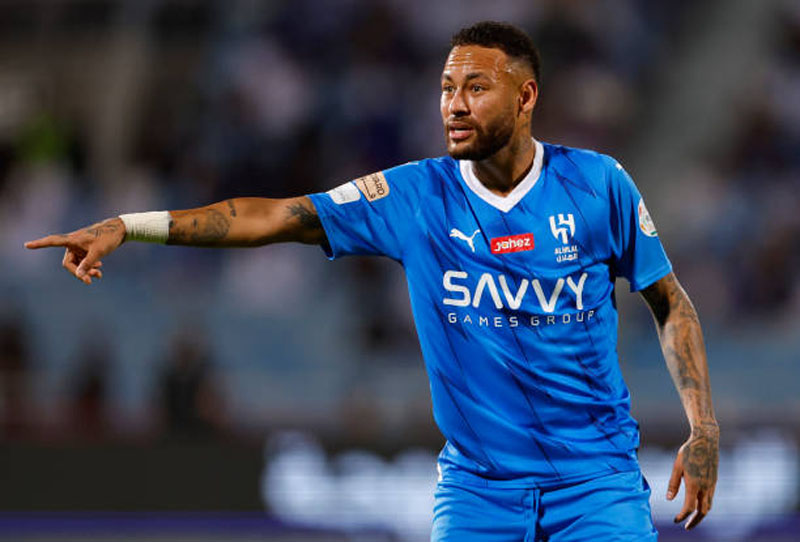 Neymar playing for Al Hilal in a blue shirt in 2023